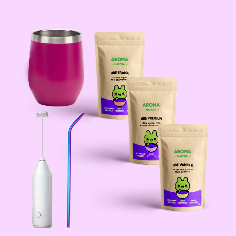 Coffret découverte Ube complet contenant une tasse isotherme magenta, un mousseur à lait, une paille inox et trois sachets de poudre d’Ube 100 % naturelle (saveurs premium, vanille et fraise).